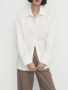 Women's long-sleeved white shirt with lapels