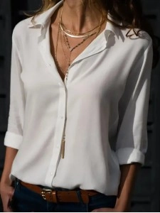 Women's solid color long sleeved button up shirt