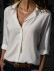 Women's solid color long sleeved button up shirt