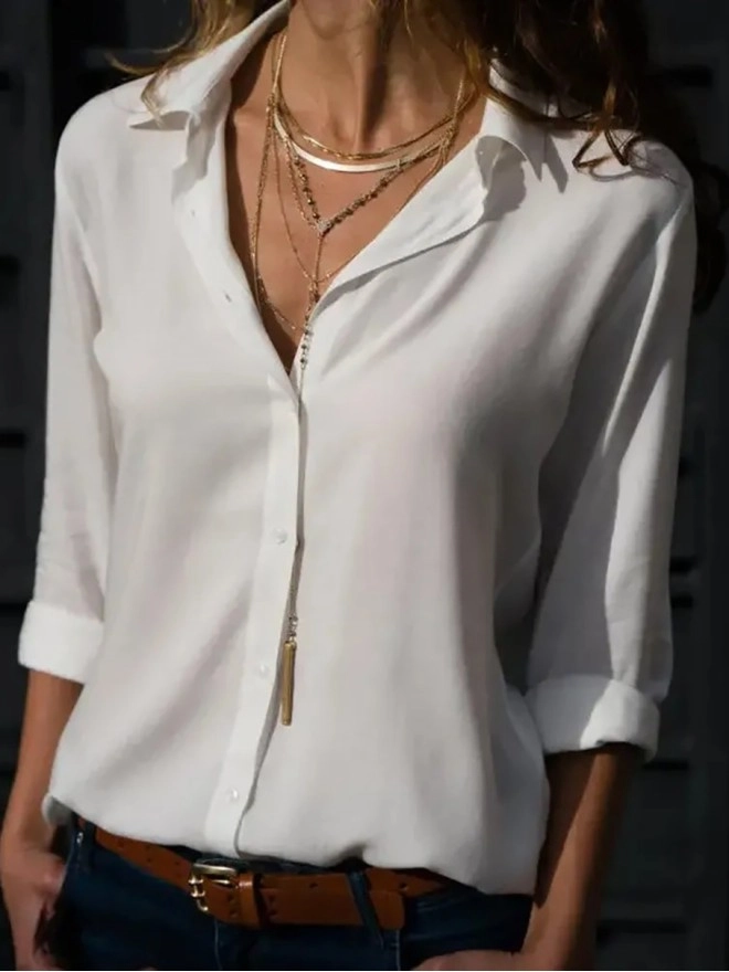 Women's solid color long sleeved button up shirt