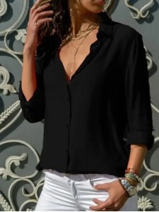 Women's solid color long sleeved button up shirt