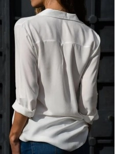 Women's solid color long sleeved button up shirt