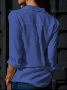 Women's solid color long sleeved button up shirt